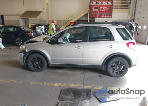 2010 Suzuki Sx4 Technology z USA, uszkodzony, nr VIN JS2YB5A39A6302670